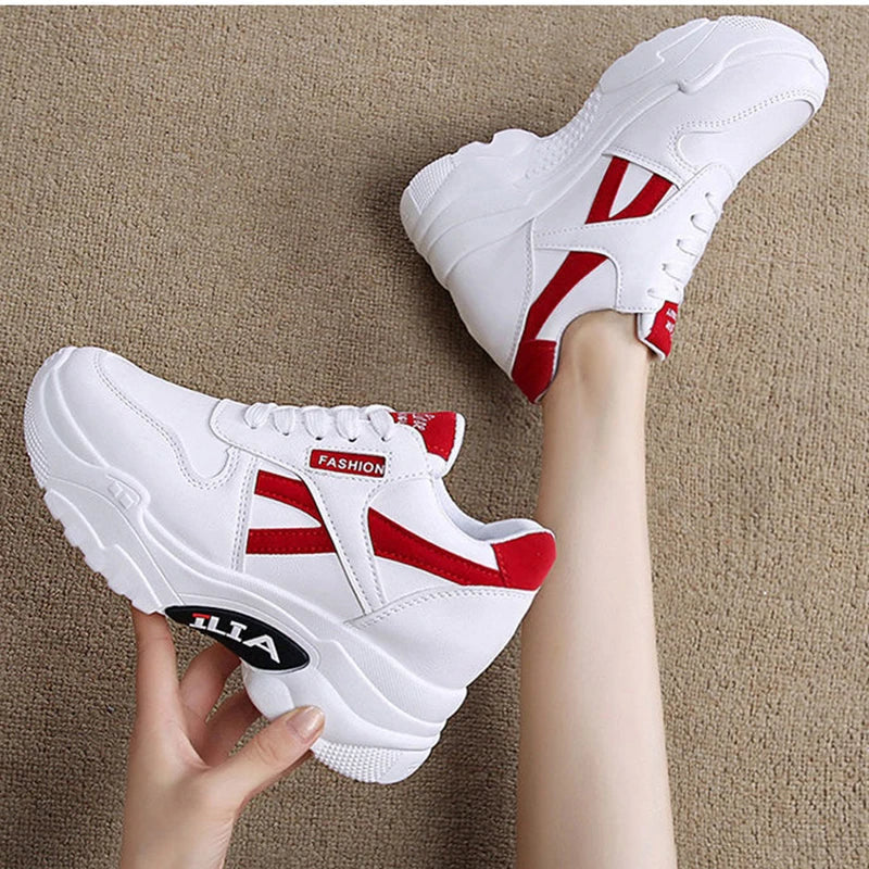 Showlu Fashion women's platform chunky sneakers in black PU leather with lace-up design and thick soles.