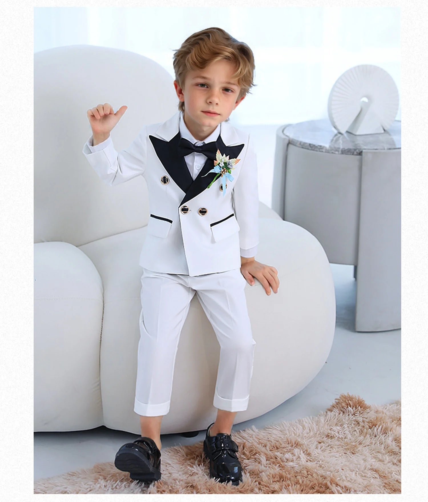 Children's white wedding suit with jacket, pants, and bowtie, perfect for flower boys and birthday parties by Showlu Fashion Store.