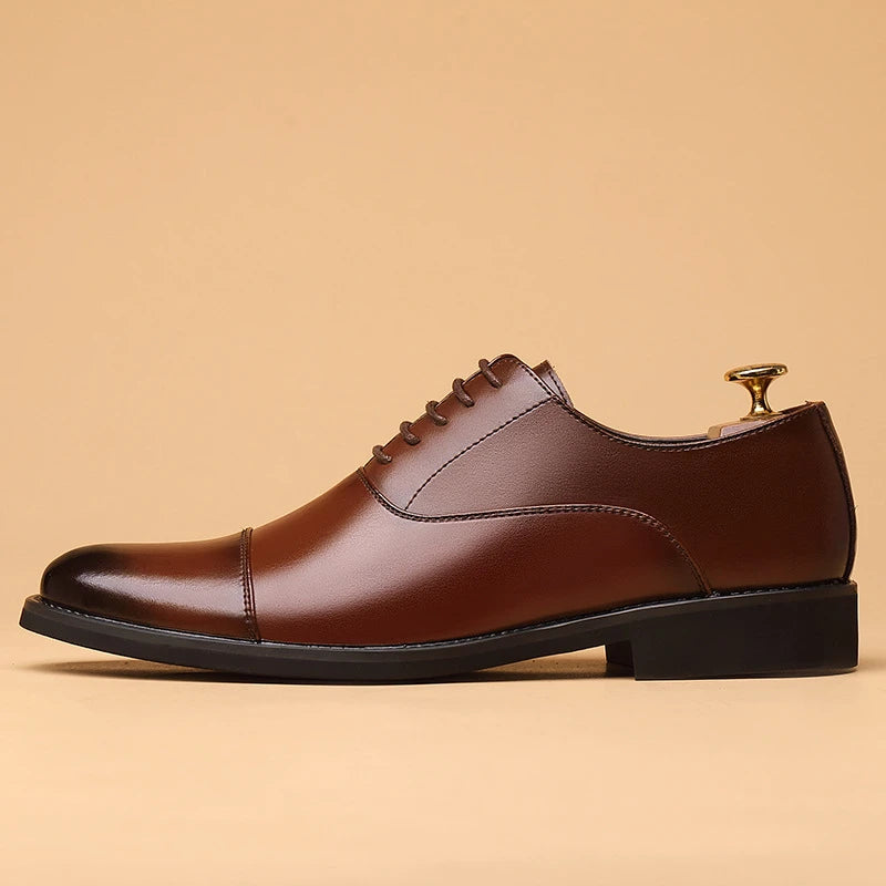 Men's black genuine leather dress shoes with cap toe, lace-up design, suitable for formal office, business, wedding, or daily wear.