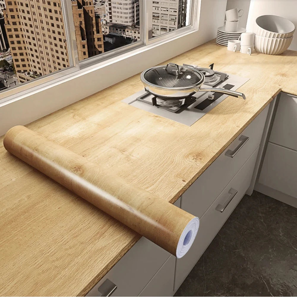 PVC waterproof self-adhesive wallpaper with wood grain design, ideal for home decor, furniture, and cabinet renovation.