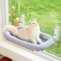 Foldable Showlu cat window hammock with upholstered perch bed, designed for cozy outdoor window lounging.