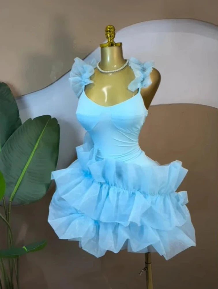Luxury ruffled U-neck mini dress by Showlu Smart General featuring sexy elegance and stylish design in a vibrant color.