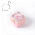 Double heart steel bracelet by SHOWLU FASHION with eternal rose box, featuring intricate heart designs on shiny silver band.