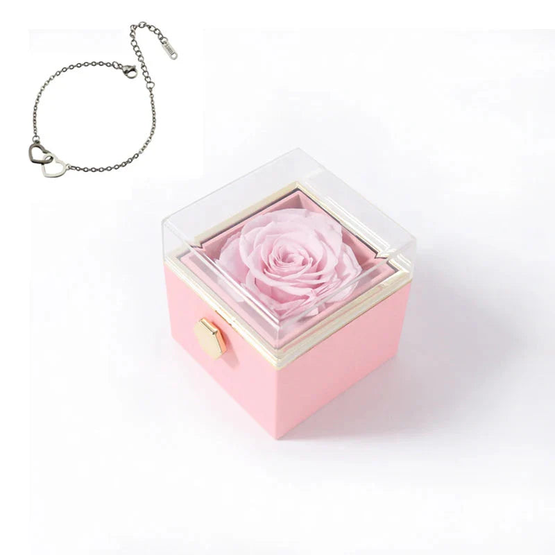 Double heart steel bracelet by SHOWLU FASHION with eternal rose box, featuring intricate heart designs on shiny silver band.