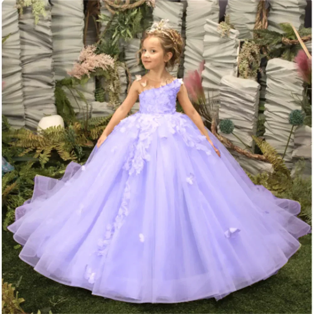 Pink flower girl dress by Showlu Fashion with 3D floral and butterfly appliqué, featuring a delicate, elegant design.