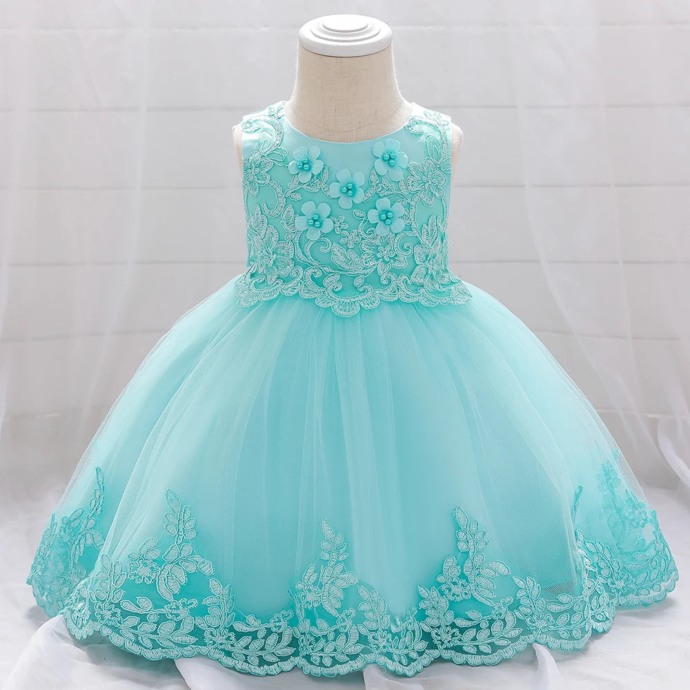 Baby girl white tulle flower dress by Showlu Fashion Store, perfect for baptism and first birthday celebrations.