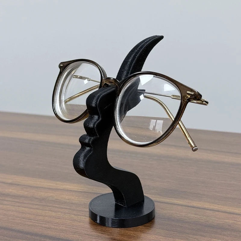 Showlu Fashion minimalist human profile eyeglass holder 3D printed stand with sleek, modern design for storing glasses.