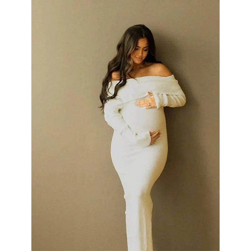 White off-shoulder knit maternity dress by Showlu Fashion Store, perfect for pregnancy photoshoots, featuring a comfortable fit and elegant style.