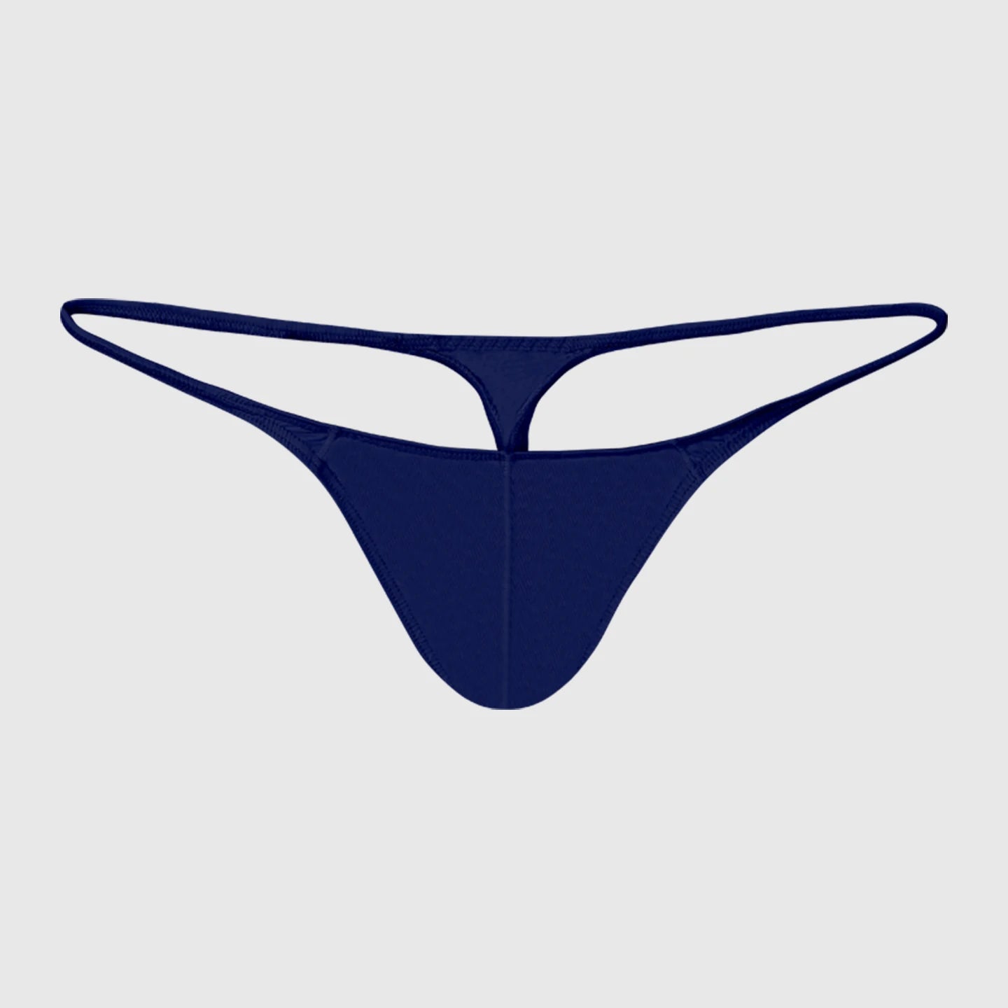Showlu Men's low-rise solid thong made of breathable nylon with stretchy fit, shown on a model.