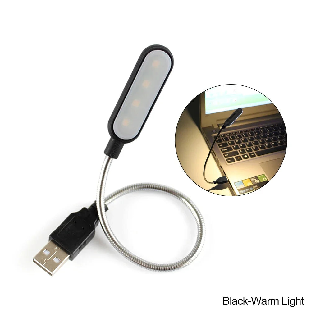 Showlu Smart General USB LED Light plugged into a laptop, providing bright, focused illumination for work or travel use.