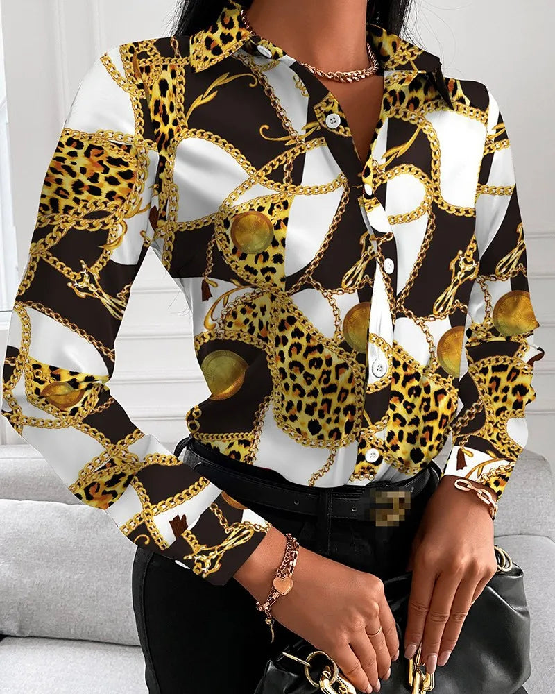 Women’s long sleeve blouse by Showlu Fashion with floral, chain, letter, and geometric square prints, turn-down collar.
