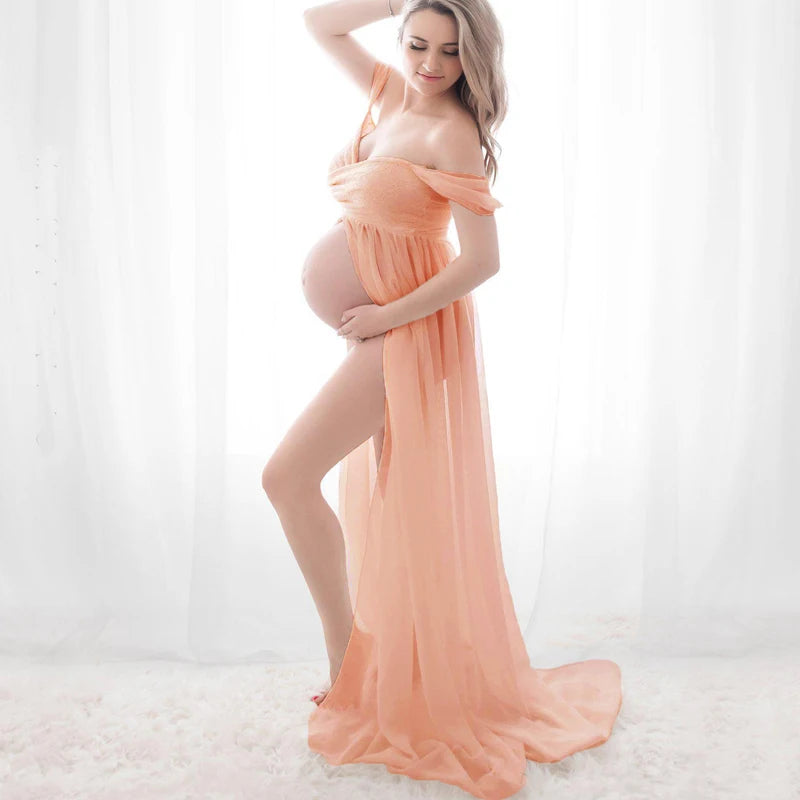 Deep V-neck lace maternity dress with long sleeves, tulle fabric, feather details, and hollow horn design, perfect for photoshoots.