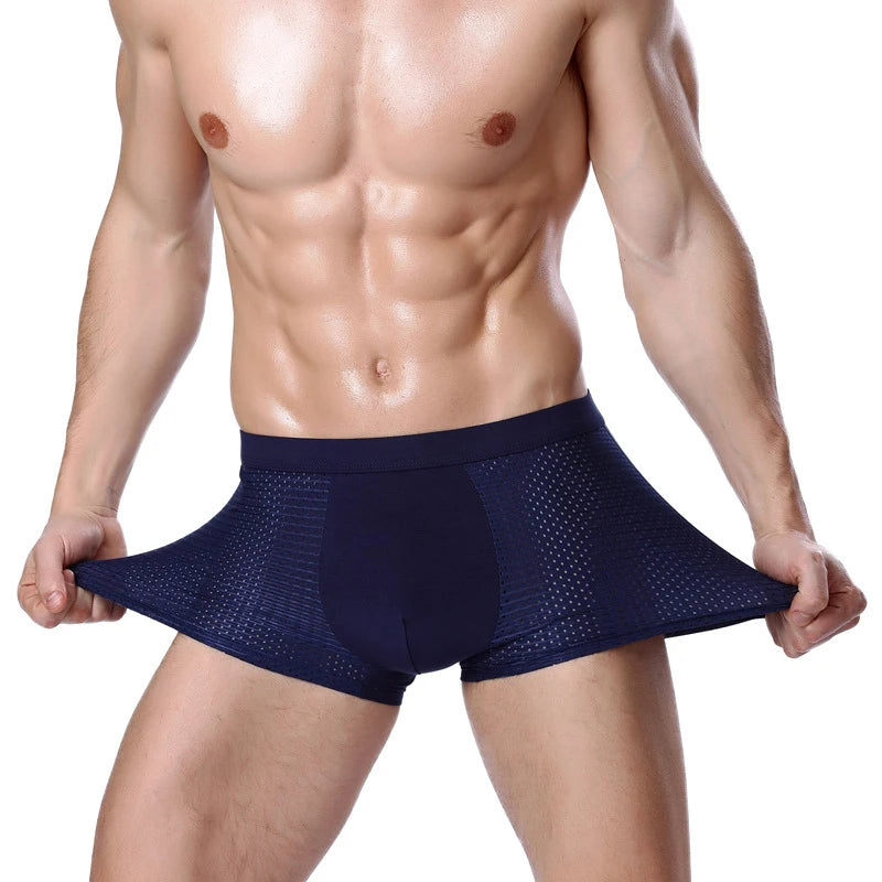 Set of four men's bamboo boxer briefs by Showlu Fashion with breathable mesh pouches in a stylish pack.