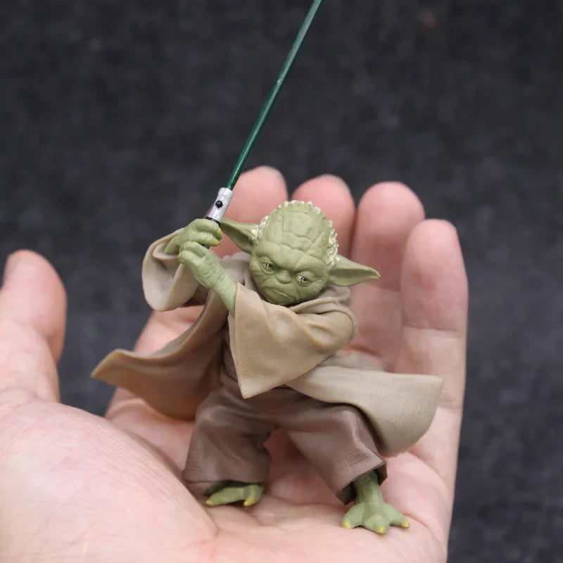 Mandalorian Master Yoda action figure by Bandai, 10cm PVC model from Star Wars, detailed collectible toy, shown standing with accessories.