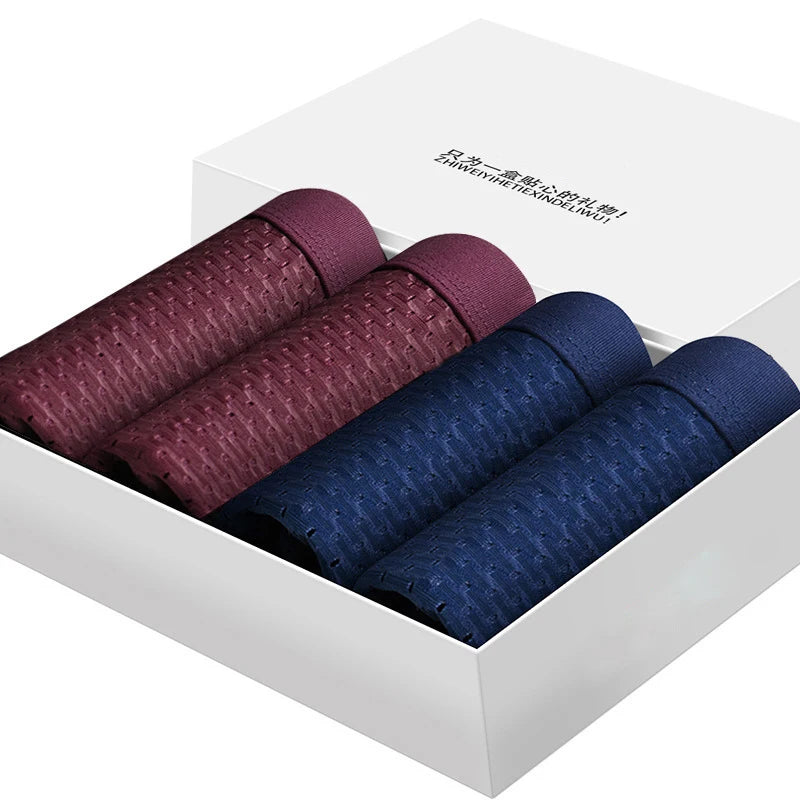 Showlu Fashion Men's Ice Silk Boxer Shorts, breathable mesh underwear 4-pack, comfortable men's underwear set with stylish design.