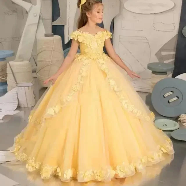 Yellow flower girl dress by Showlu Fashion with beading and appliqué, perfect for pageants, birthdays, and first communions for girls.