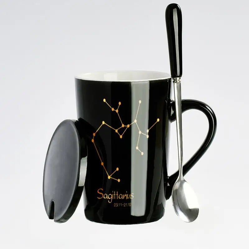 Black ceramic coffee mug featuring 12 zodiac signs, lid, and spoon from Showlu Fashion Store, ideal for astrology enthusiasts.