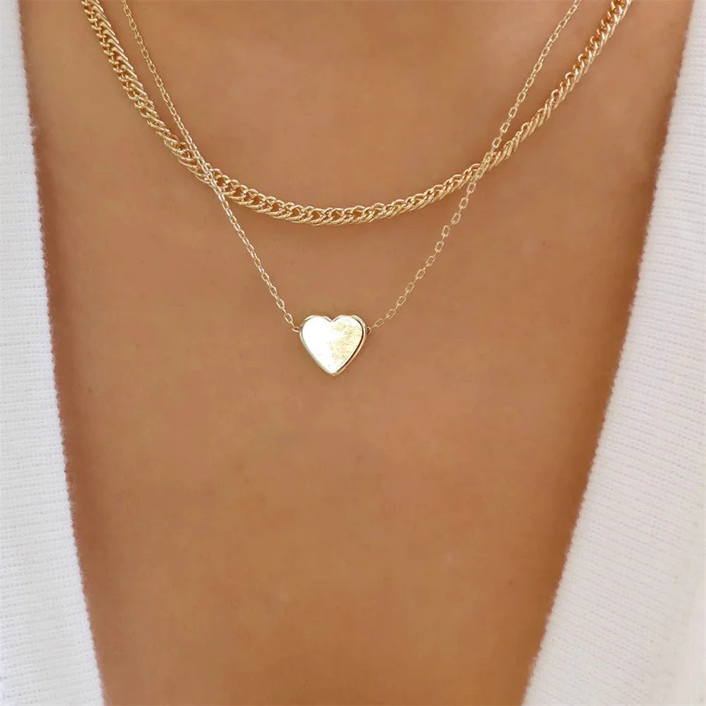 Vintage elegant round pearl pendant necklace for women, featuring multi-layer gold chain choker jewelry, stylish and trendy.