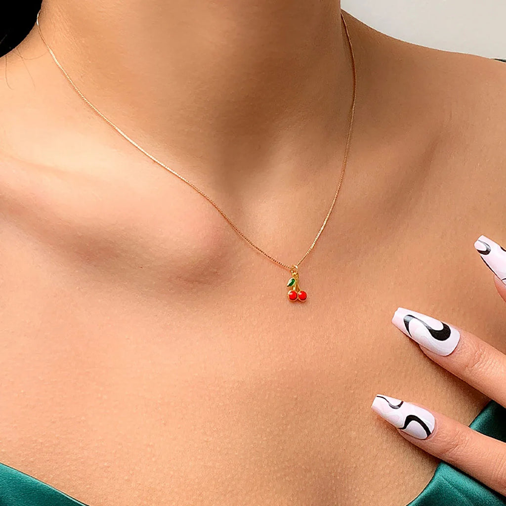 Gold-colored boho clavicle necklace with cherry pendant, romantic jewelry for women, stylish gift idea from Showlu Fashion.
