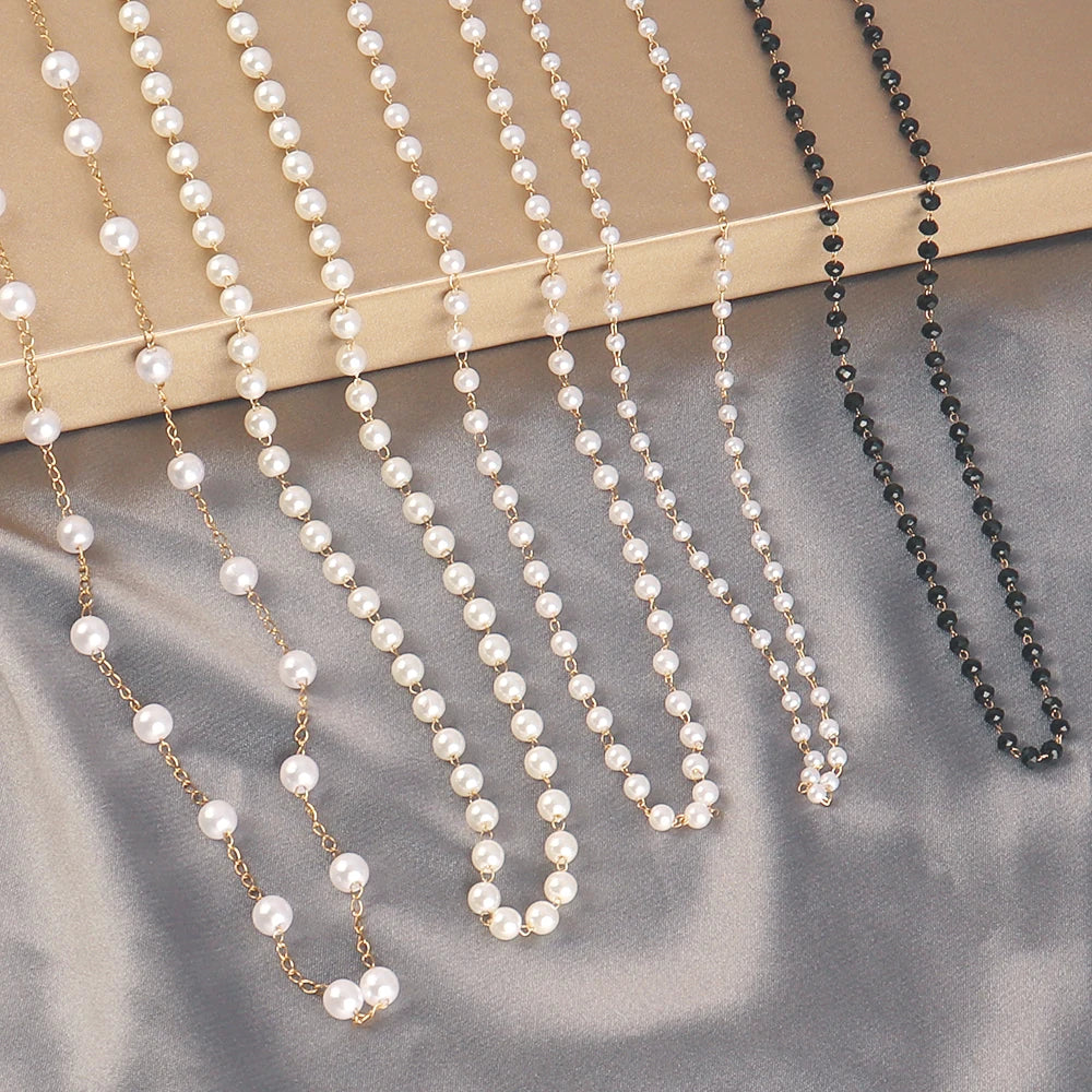 Stainless steel pearl necklace for women featuring white imitation pearls, delicate clavicle chain, elegant choker style jewelry