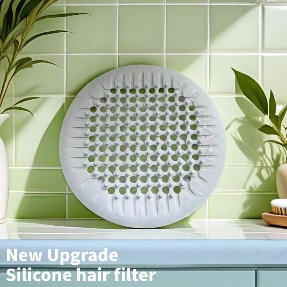 Showlu Smart General silicone drain cover preventing debris from clogging kitchen or bathroom drains.