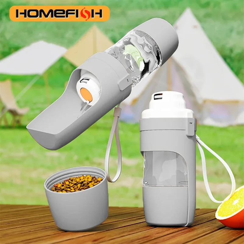 Showlu Portable Dog Water Bottle and Food Container, 500ml travel pet feeder with integrated water and food storage.