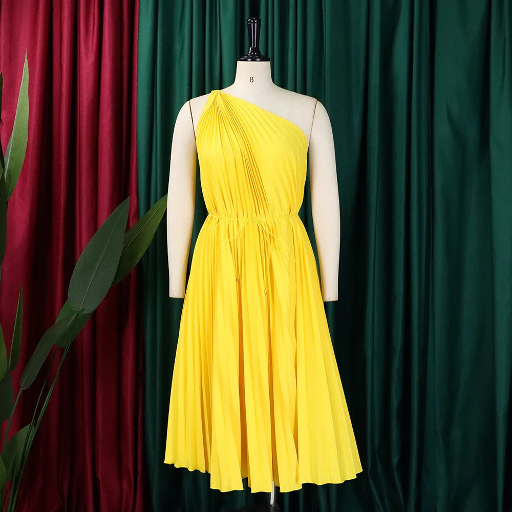 Women’s one-shoulder sleeveless pleated knee-length swing dress by Showlu Fashion, perfect for stylish street wear and casual occasions.