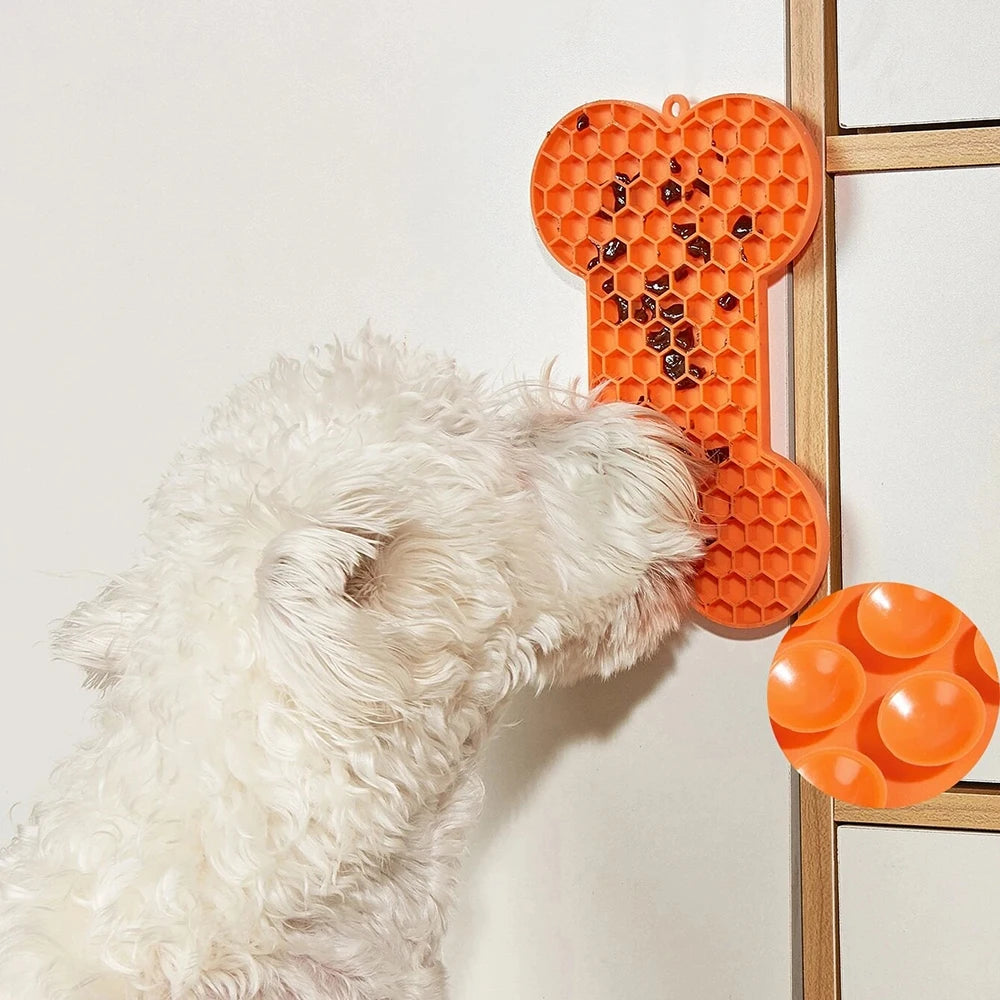 Silicone dog slow food pad and licking mat with bone design for pets, ideal for dogs and cats, from Showlu Fashion Store