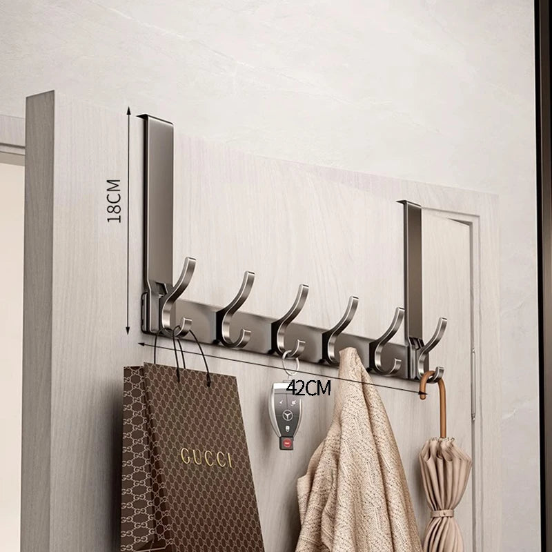 Wall-mounted multi hooks by Showlu Smart General, showing a set of versatile hooks attached to a modern wall for organization.