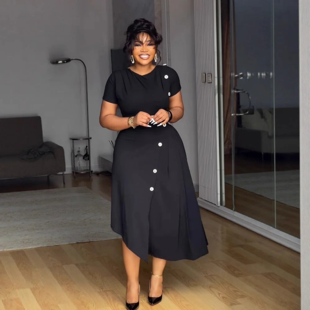 Elegant women's round-neck pleated dress with button details and irregular slit hem, perfect for commuting and stylish wear.
