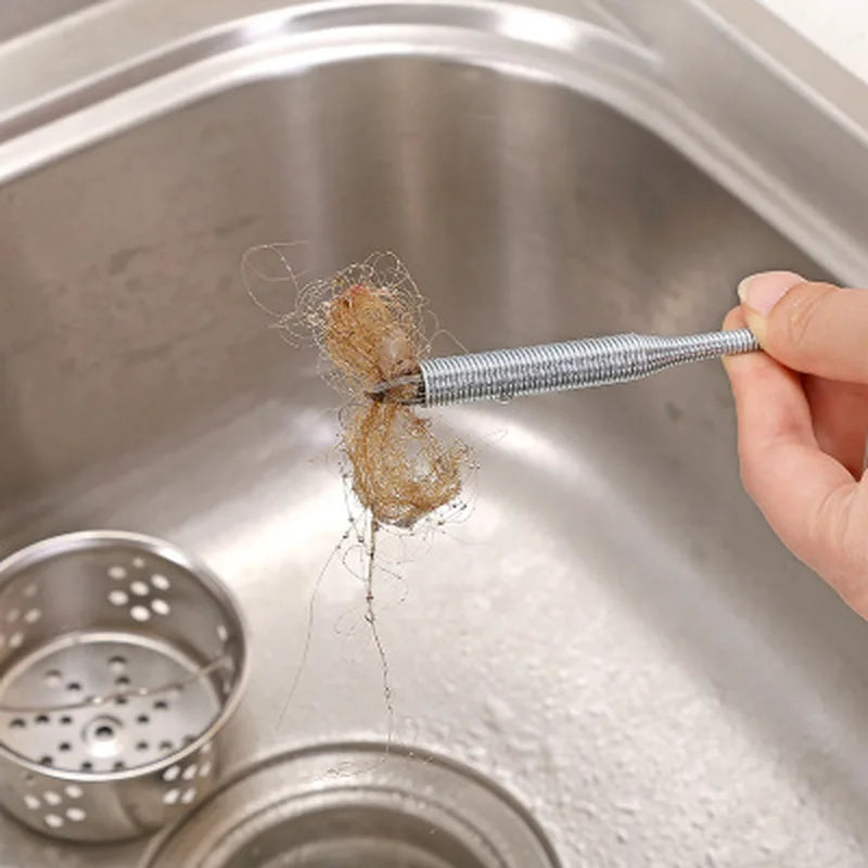 Showlu Smart General drain snake hair remover tool with flexible, metal wire coil for clearing clogged drains and hair blockages.