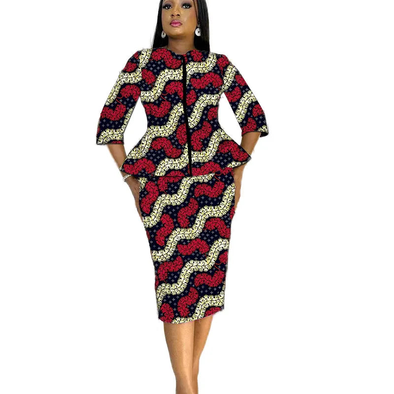 African print women's party outfit featuring a tailored blouse and skirt set, vibrant colorful patterns, and stylish design.