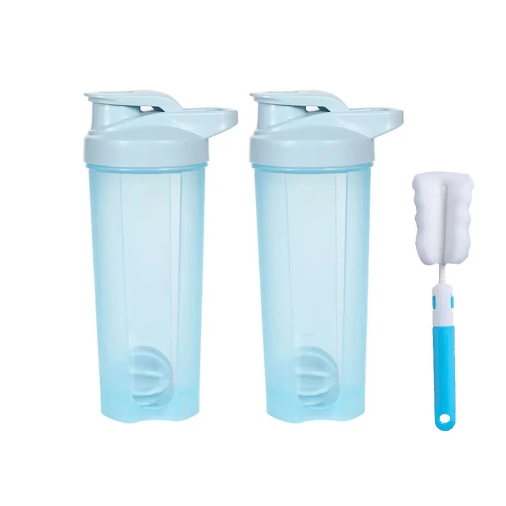 Showlu Fashion Store 28 oz protein shaker bottle with ball whisk and handle, designed for mixing supplements and smoothies.