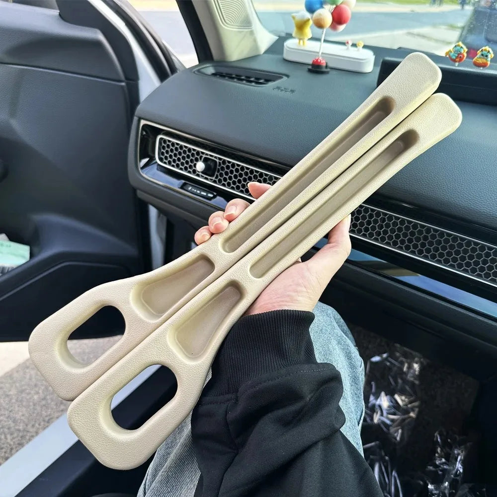 Showlu Smart General car seat gap organizer shown in black, fitting between car seats to prevent items from falling.
