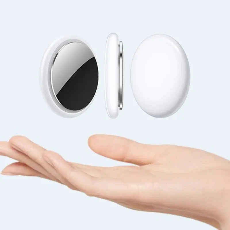 Showlu Smart Key Finder mini GPS tracker for kids, pets, and Airtags with compact design and keyring attachment.