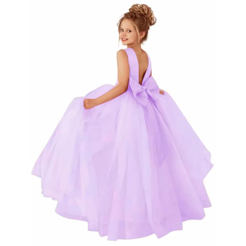Dusty pink flower girl dress by Showlu Fashion Store with pearl belt, ball gown style, perfect for weddings and special occasions.