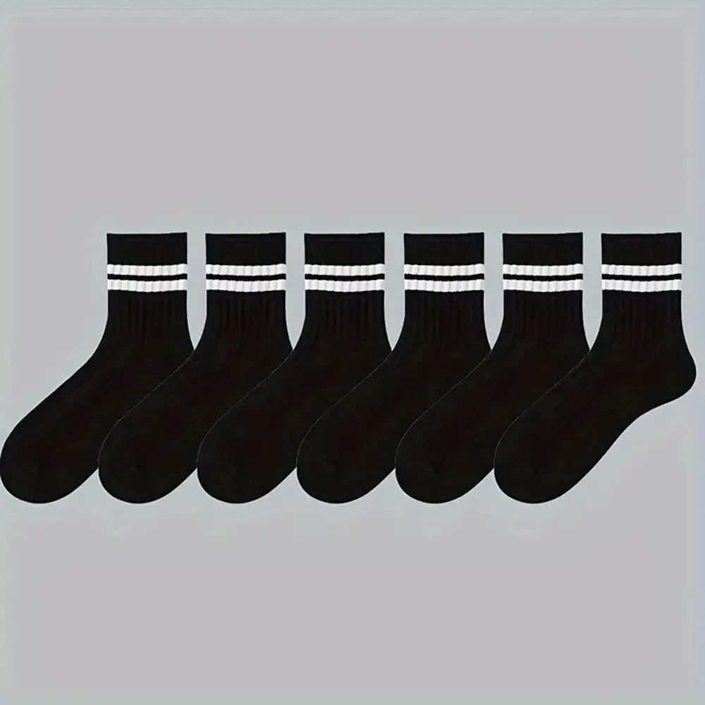 Six pairs of men's breathable spring and autumn casual black and white striped mid-tube socks with high-quality round neck design.