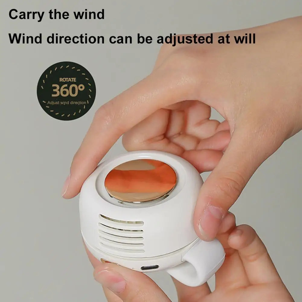 Showlu Smart General portable USB clip fan with 60 blades, compact design, and adjustable clip for personal cooling.