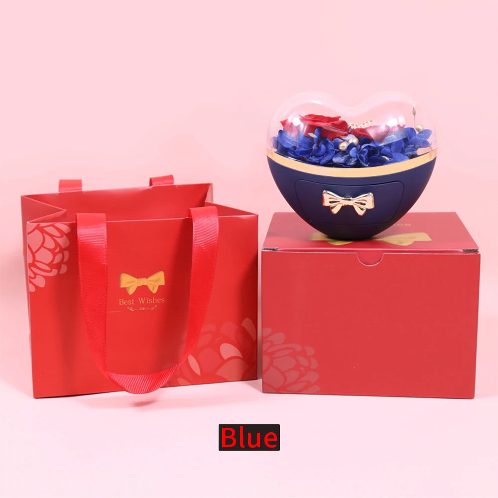 Heart-shaped Showlu Fashion jewelry box with a stylish necklace gift set, featuring elegant design and jewelry inside.