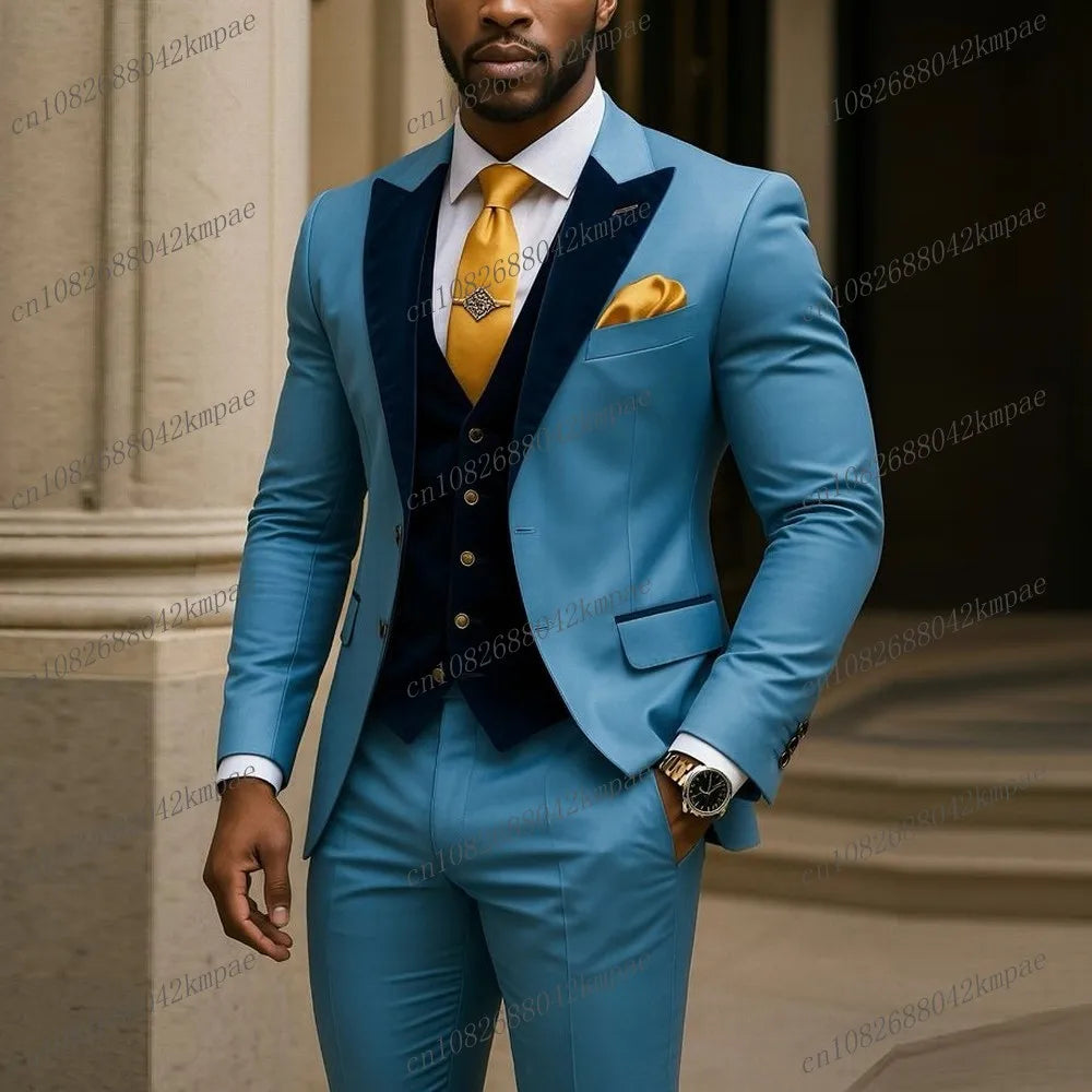 Light blue and dark blue velvet men's business suit with blazer, vest, and pants, ideal for formal events and weddings.