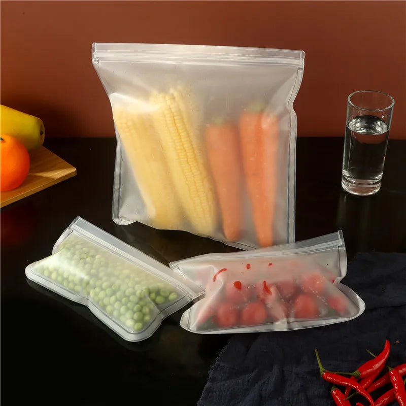 Reusable food storage bags by Showlu Smart General, clear silicone bags with airtight seals for fresh food storage.