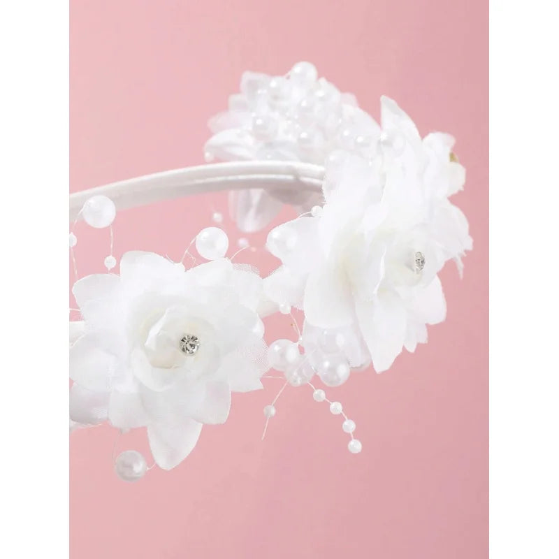 White flower girl headband with elegant floral design, perfect for wedding bridal parties and children's hair accessories.