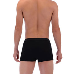 A man seen from behind wearing solid black boxer briefs.