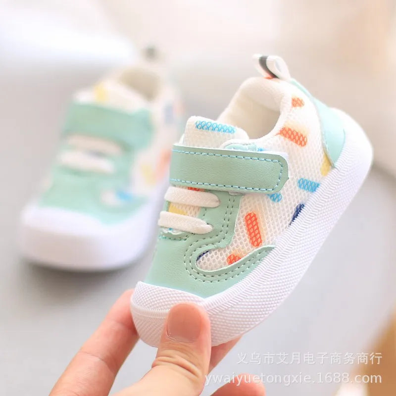 Unisex baby sneakers from SHOWLU FASHION STORE with breathable mesh fabric and soft rubber sole, ideal for active little feet.