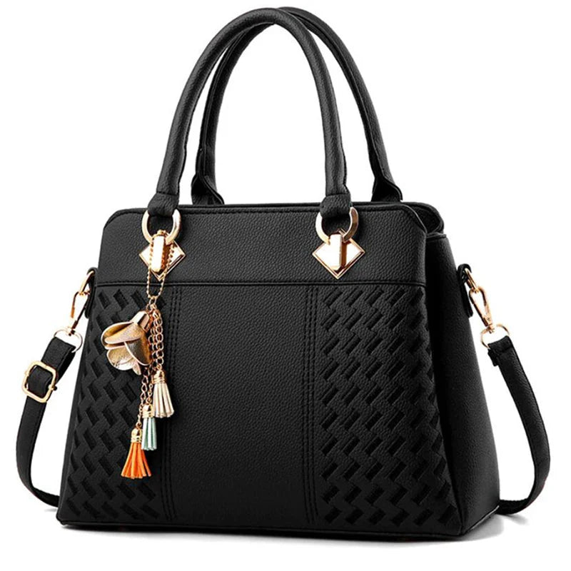 Luxury embroidery PU leather tote bag with tassel from SHOWLU FASHION STORE, featuring large capacity and stylish design.