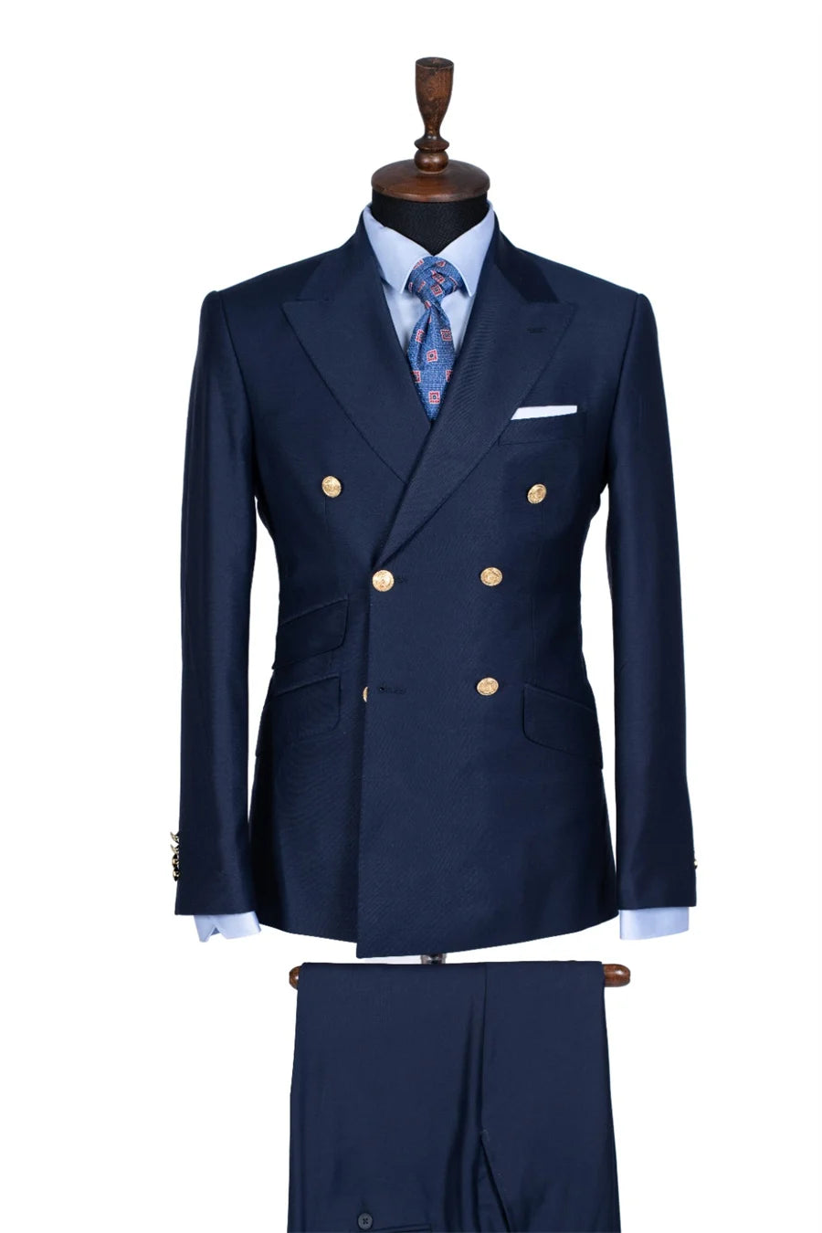Slim fit double-breasted men's tuxedo with peak lapel, jacket and pants, perfect for weddings and formal events.