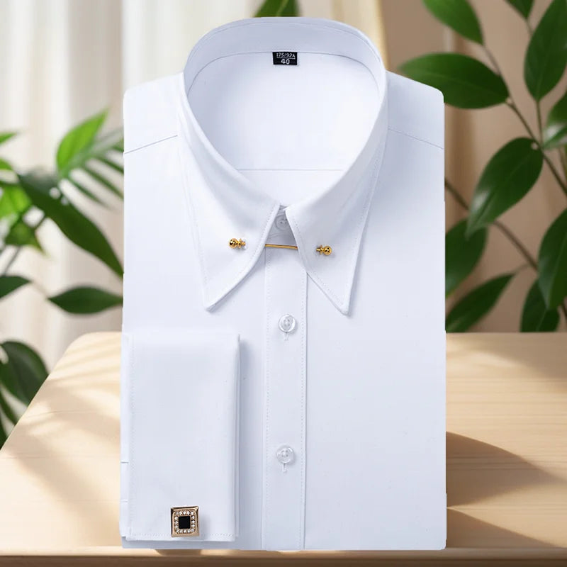 Embroidered French cufflinks on a men's long-sleeve dress shirt with collar pins, tailored for formal business attire.