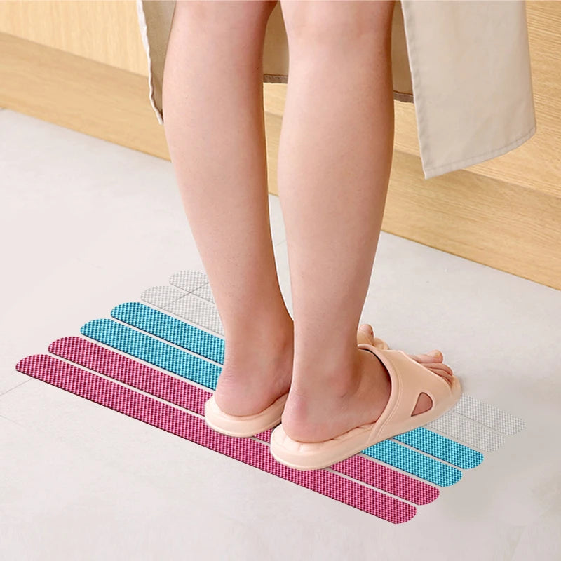 Anti-slip shower stickers from Showlu Smart General, featuring textured adhesive pads for secure grip on bathroom surfaces.