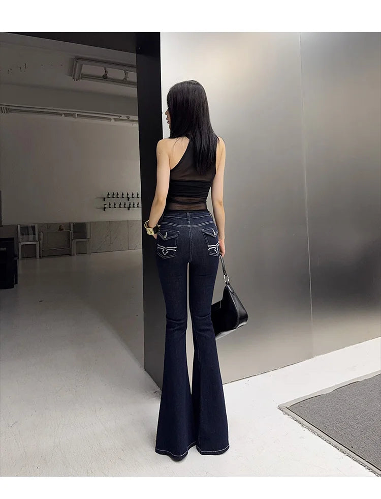 Women’s vintage blue flare jeans with embroidery, high waist, Y2K streetwear style, denim cargo pants, bell bottom trousers.