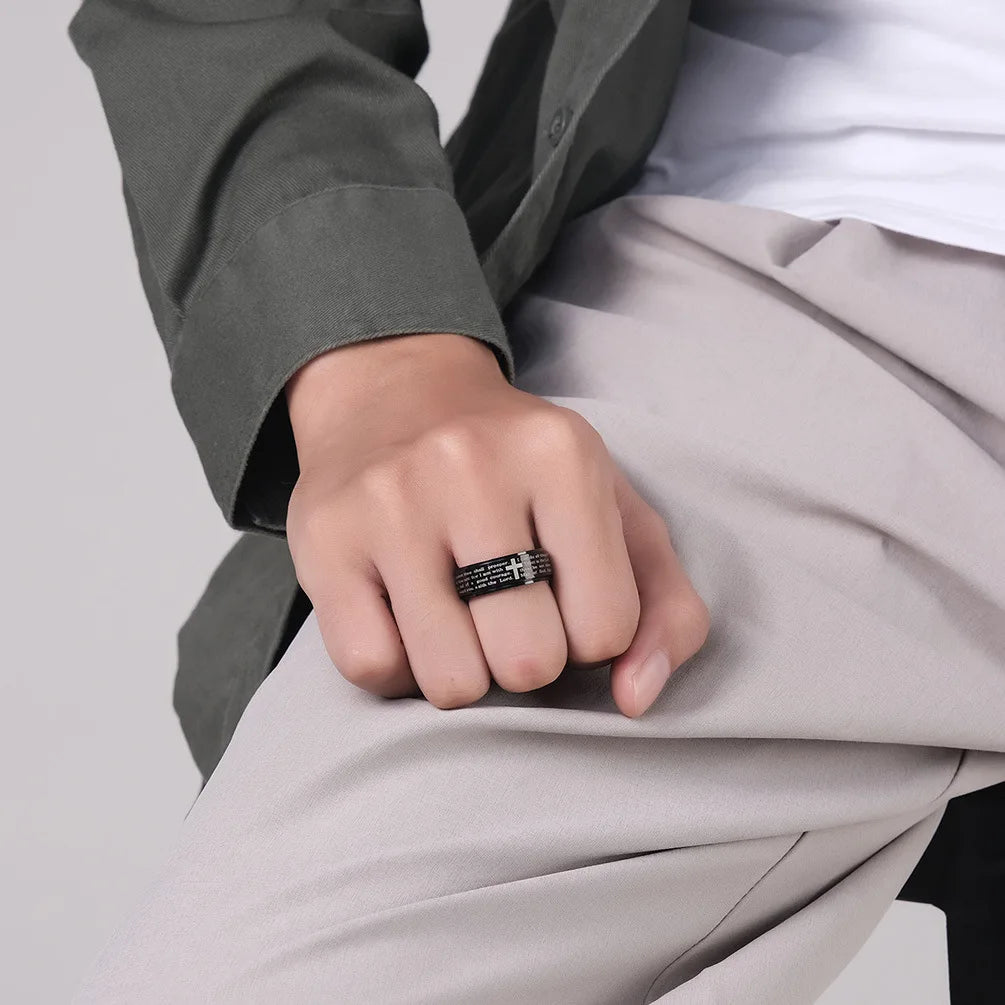 Showlu stainless steel Christian cross spinner anxiety ring for men and women, featuring a detailed cross design.